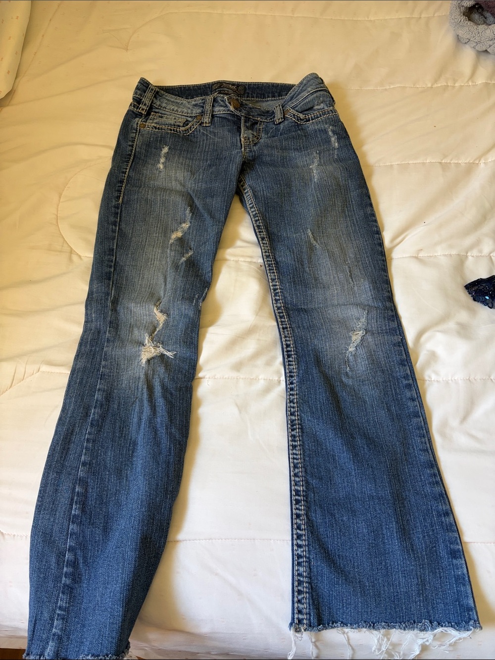 Silver Jeans Distressed Medium Blue Flare Jeans
